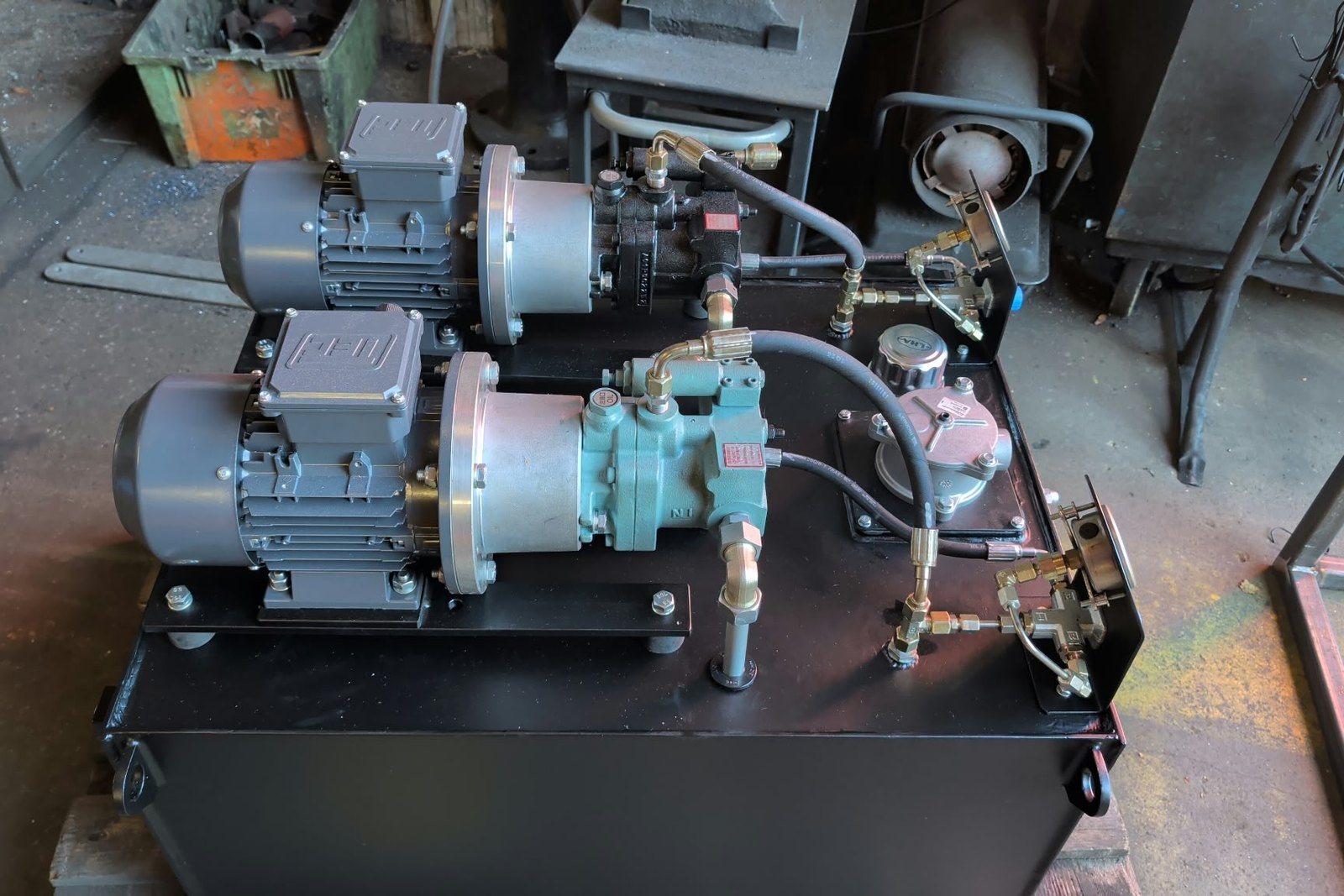 Side view of new hydraulic power pack and raised support frame