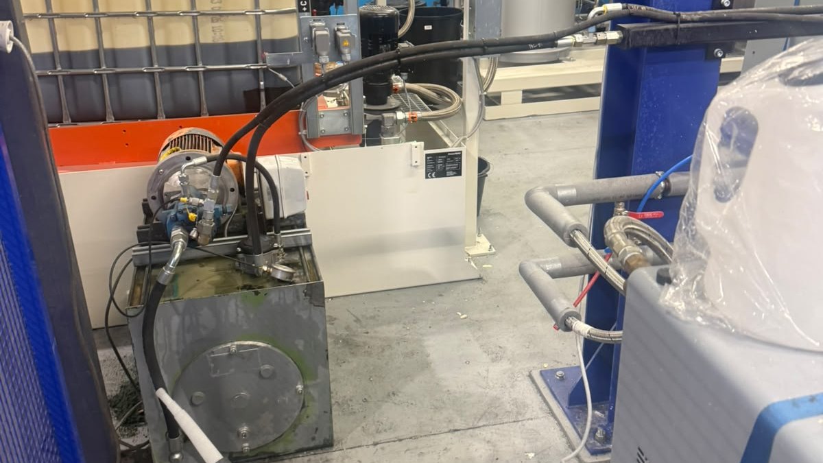 Existing hydraulic power pack and pipework on the manufacturing machine
