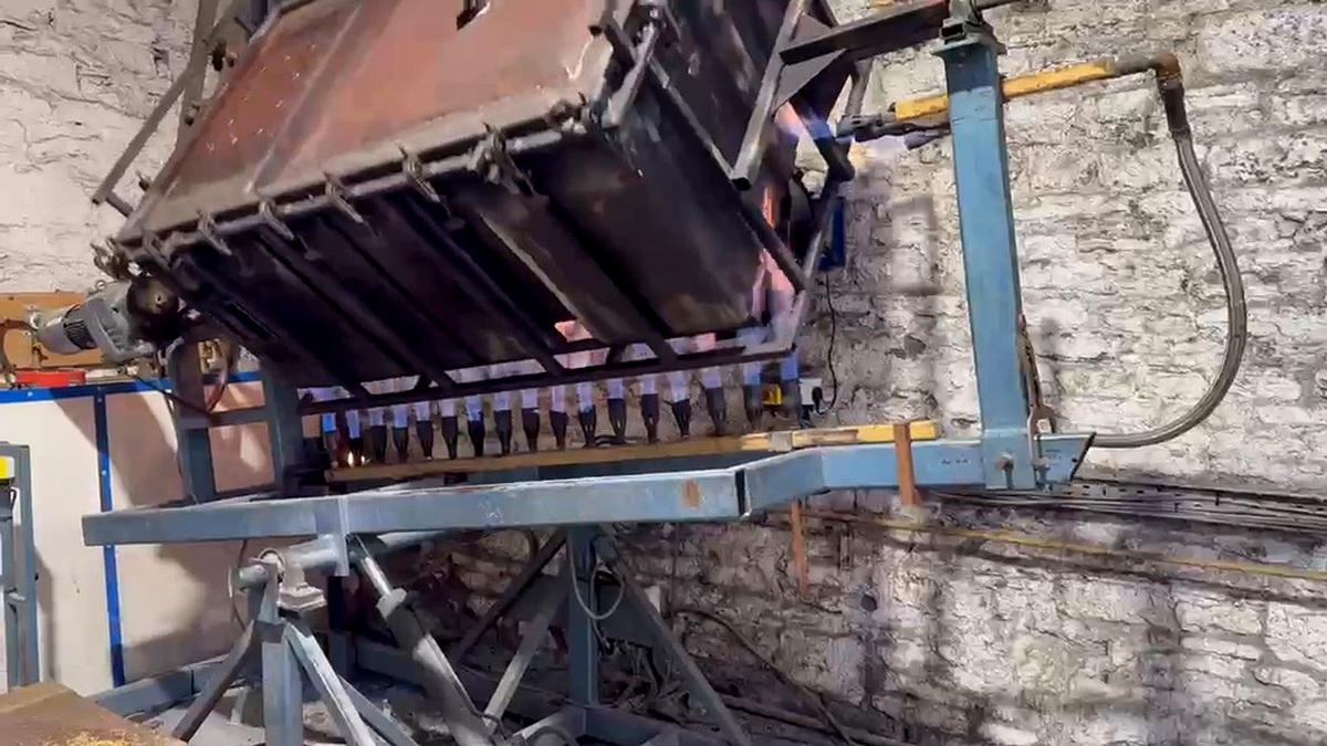 Existing rotational moulding machine upgraded with hydraulic and electrical controls