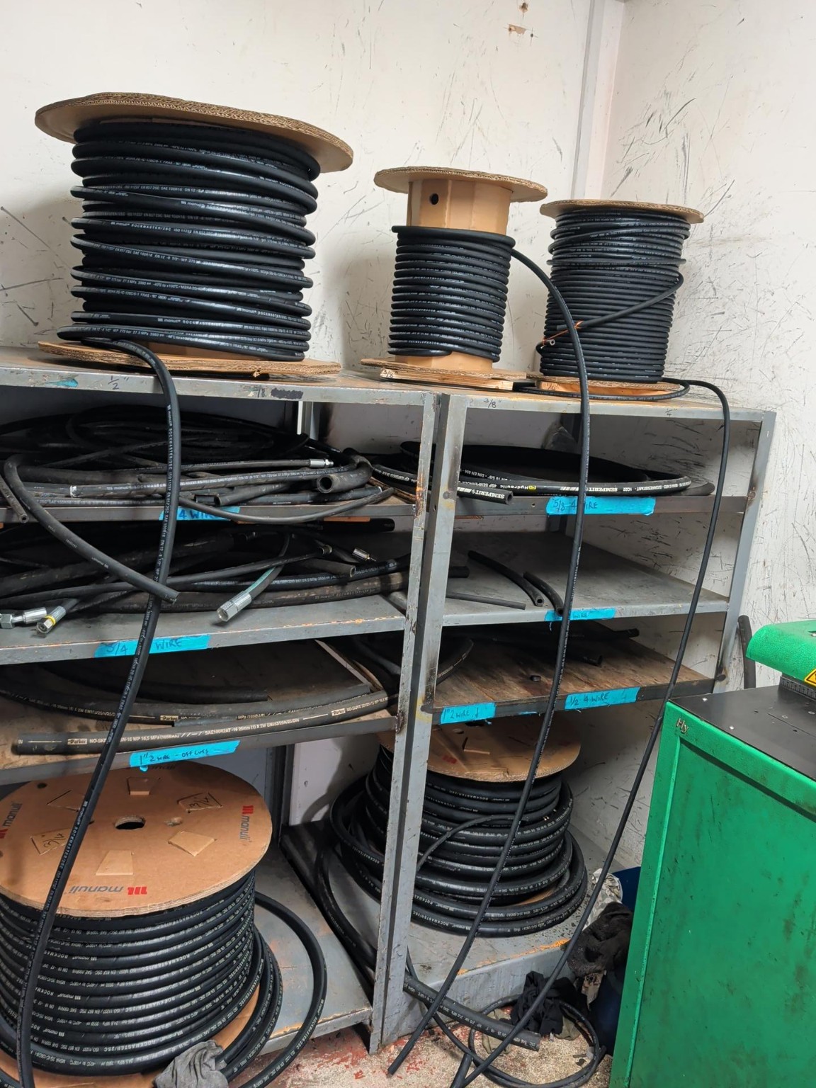 Hydraulic hose reels and hose stock in the Active Hydraulics workshop